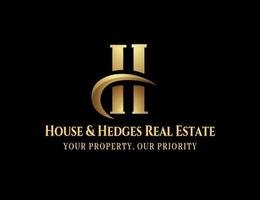 HOUSE & HEDGES REAL ESTATE logo